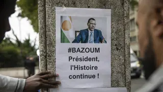 Protesters gather in front of the Embassy of Niger in Paris, in support of Nigerien President Mohamed Bazoum