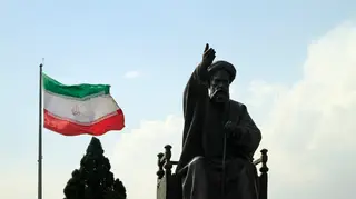 Big Iranian flag in the wind in Tehran, Iran