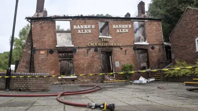 The burnt out remains of The Crooked House pub which was set alight around 10pm on Saturday night