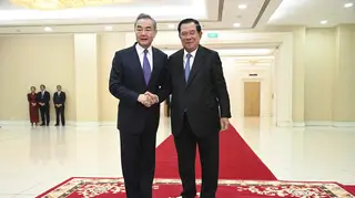 Chinese Foreign Minister Wang Yi and Cambodian Prime Minister Hun Sen