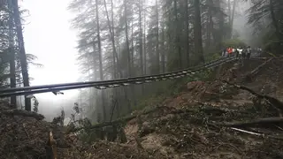 A section of the Shimla-Kalka railway track washed away by heavy rain
