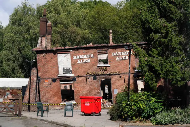 The burnt out remains of The Crooked House pub near Dudley.