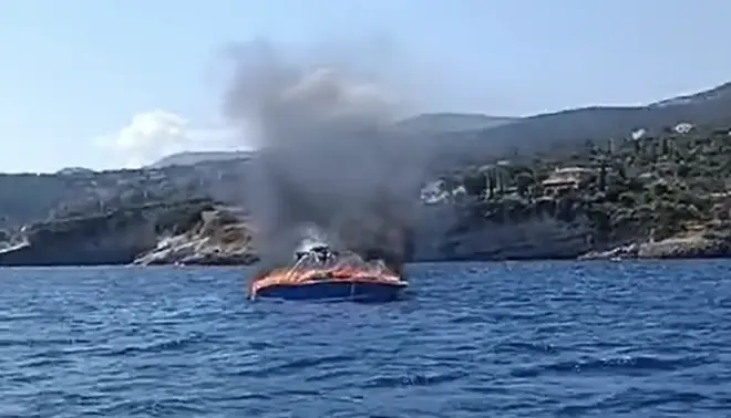 The incident took place around 250 feet from the shore of the Greek island - forcing another vessel to get involved in the rescue.