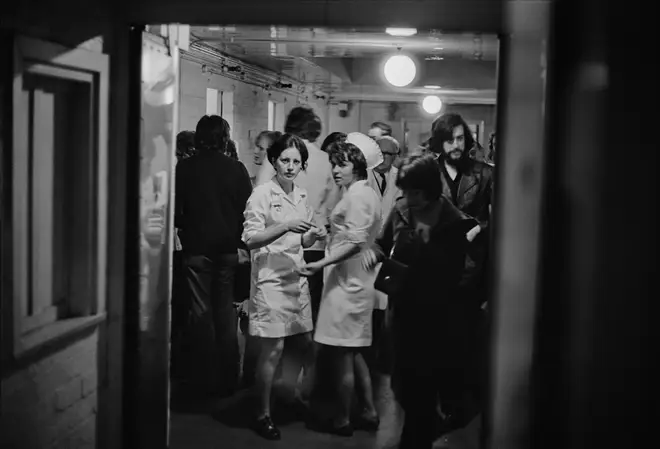 Hospital staff in a busy corridor in the aftermath of the Birmingham pub bombings