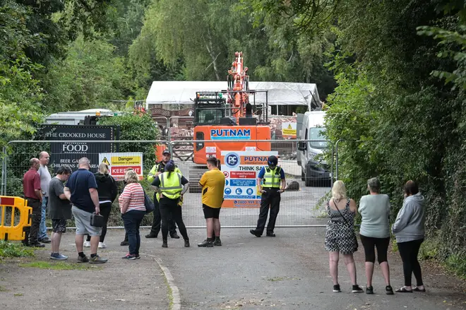 Angry protesters turned up at the site of The Crooked House in Himley, Staffordshire after demolition crews from the Putnam company turned up on Monday afternoon