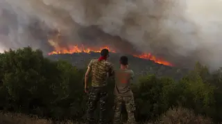 A wildfire near the north-eastern Greek village of Sykorrahi