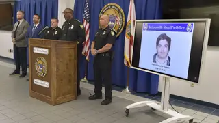 A photograph of gunman Ryan Christopher Palmeter is shown on a video monitor during Sheriff TK Waters’ press conference at the Jacksonville Sheriff’s Office headquarters building in Jacksonville, Flor