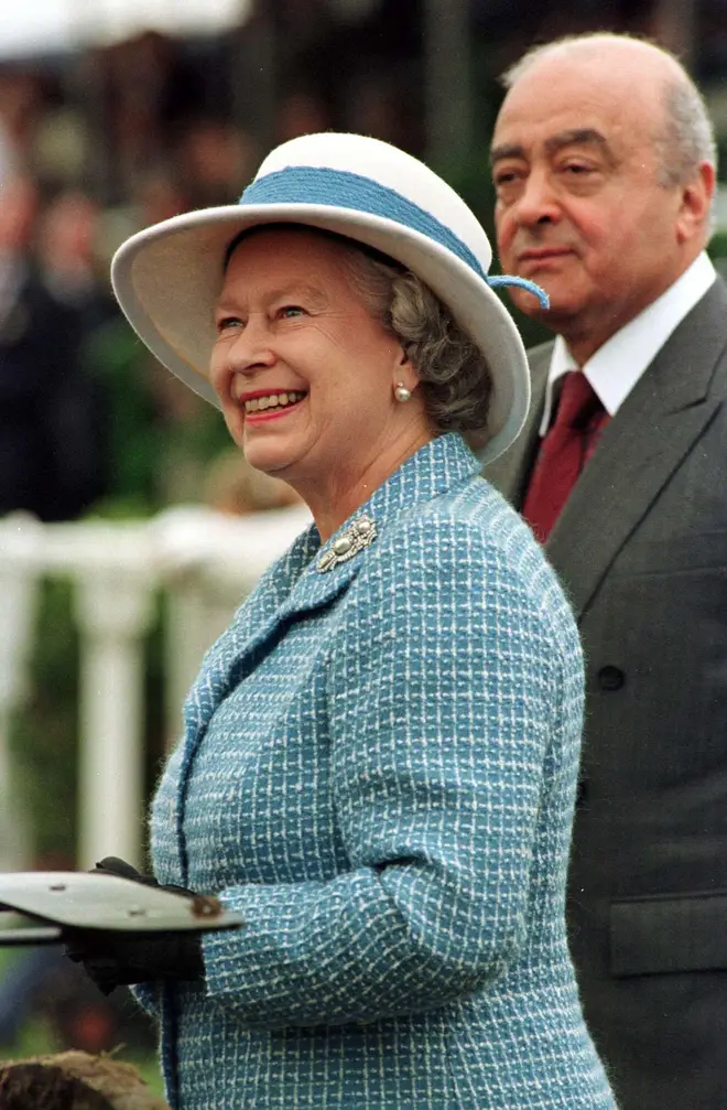 Mr Al-Fayed with the Queen in 1997
