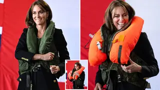Kate laughed as she tried on a lifejacket on a visit to a Naval base