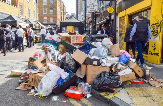 Growing piles of garbage line the streets in the London borough of Tower Hamlets as waste collectors continue their strike