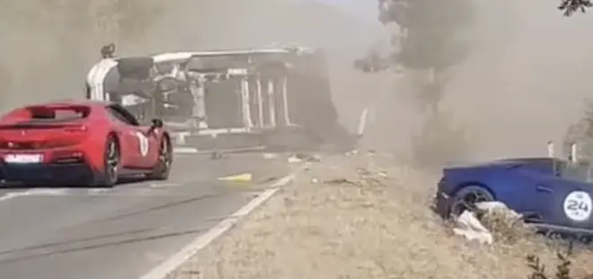 The couple crashed a red Ferrari while trying to overtake a camper van, and died when their crashed car burst into flames