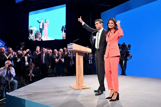 Prime Minister Rishi Sunak on stage with wife Akshata Murty following his speech during the final day of the Conservative Party Conference