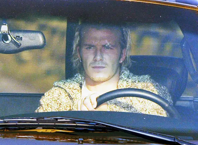 Beckham arriving at Manchester United's training ground after the boot incident