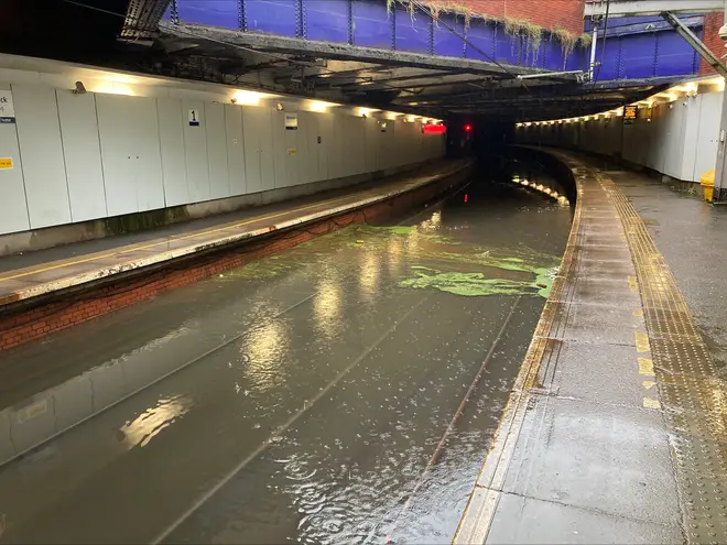 Network Rail Scotland shared images of the flooded rail tracks as they announced suspended services.