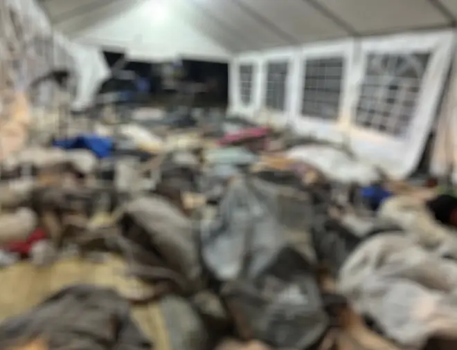 Bodies of those killed in the attack have been piled up in tents