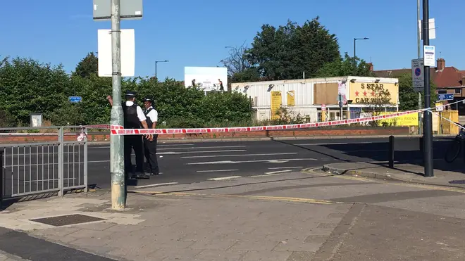 A police cordon remains in place after a man died following a shooting in Wembley