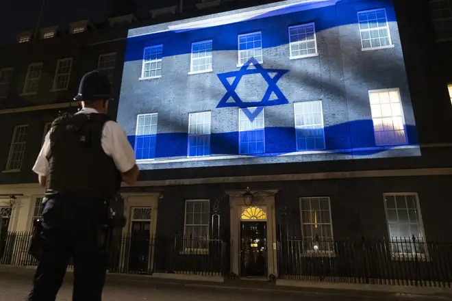 The Israeli flag is shone on Number 10 Downing Street on Monday evening