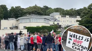 Protesters outside Stradey Park Hotel in Llanelli, south Wales