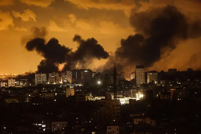 Smoke billows over Gaza city after Israel launched multiple airstrikes in retaliation for this weekend's attacks