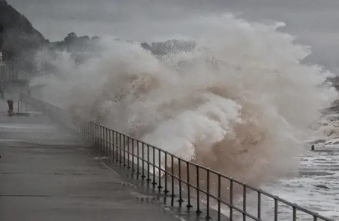 Storm Babet brings huge waves crashing into Teignmouth, Devon