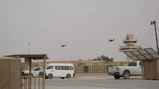 Task Force Phoenix UH-60 Black Hawk helicopters conduct a MEDEVAC mission from Al Asad Airbase.