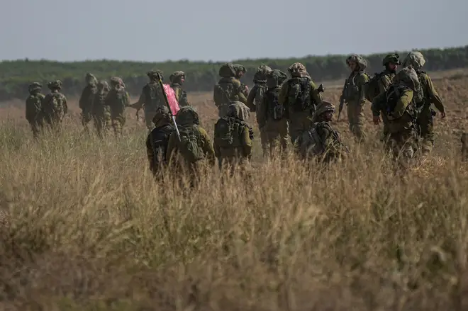 Israeli troops waiting on the Gaza border
