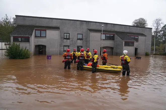 Rescuers work in Brechin after the town was flooded