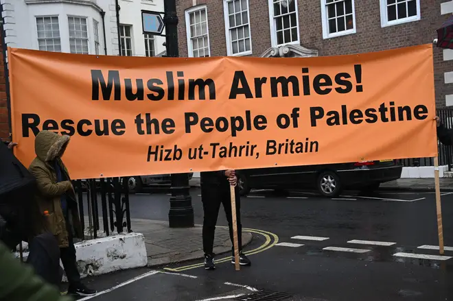 A Muslim armies banner unfurled during pro-Palestine protests
