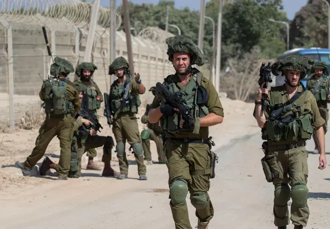 Israeli soldiers are braced to invade Gaza
