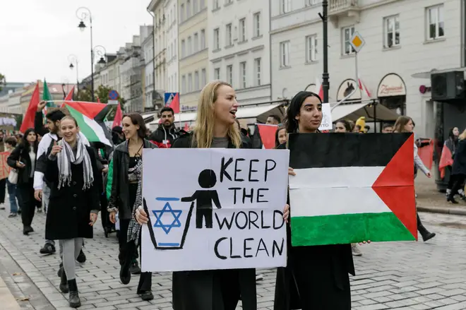 Andersen was pictured holding anti-Semitic the sign during the march.