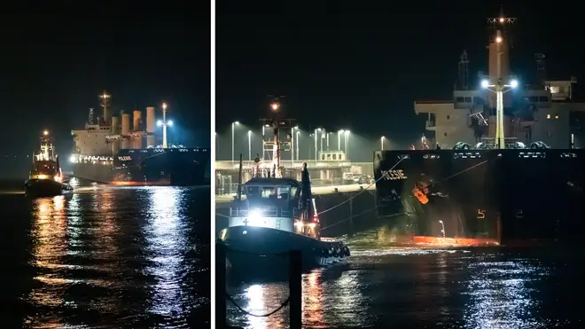 Damaged freighter "Polesie" is dragged back to port after the two freighters collided in the North Sea off Helgoland