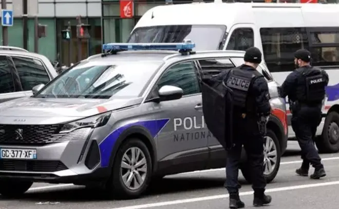 Armed police had entered the station.