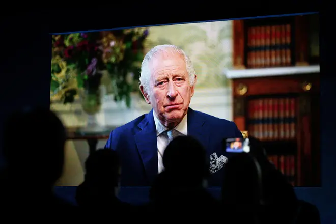 Britain's King Charles III addresses delegates in a pre-recorded video message