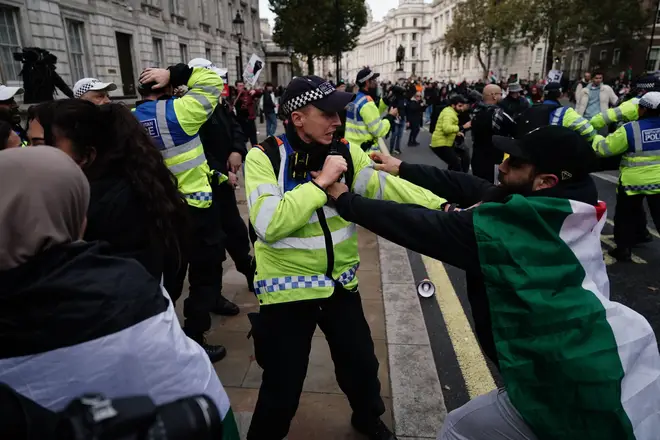 Police Officers clash with pro-Palestinian protesters on Whitehall