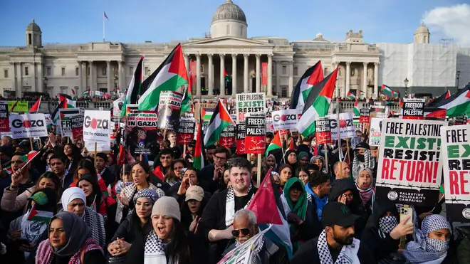 People at a rally in Trafalgar Square