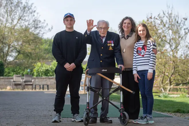 Captain Tom Moore, with (left to right) grandson Benji, daughter Hannah Ingram-Moore and granddaughter Georgia