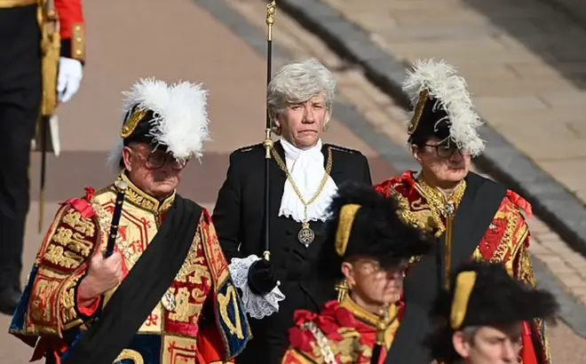 Black Rod is the name given to the House of Lords official, who is sent to summon the Commons for the ceremony. The role has been held by Sarah Clarke (pictured) since February 2018
