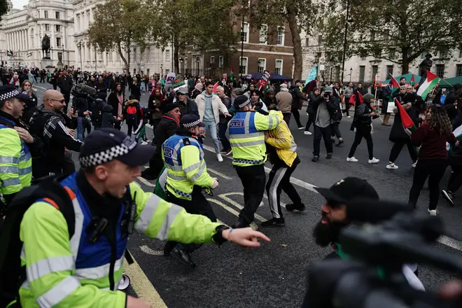 Police Officers clash with rival supporters as protesters walk past the Cenotaph on Whitehall during a pro-Palestine march organised by Palestine Solidarity Campaign in central London last month