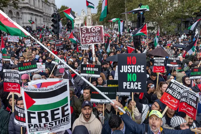 Pro-Palestinian protesters attend a rally close to Downing Street