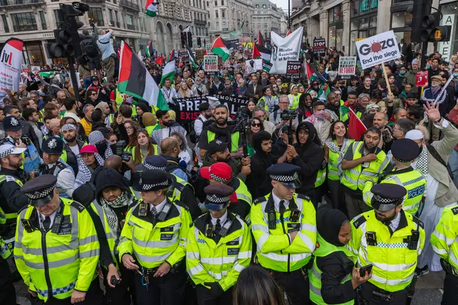 Tens of thousands of pro-Palestinian demonstrators march to Downing Street in support of the Palestinian population of Gaza