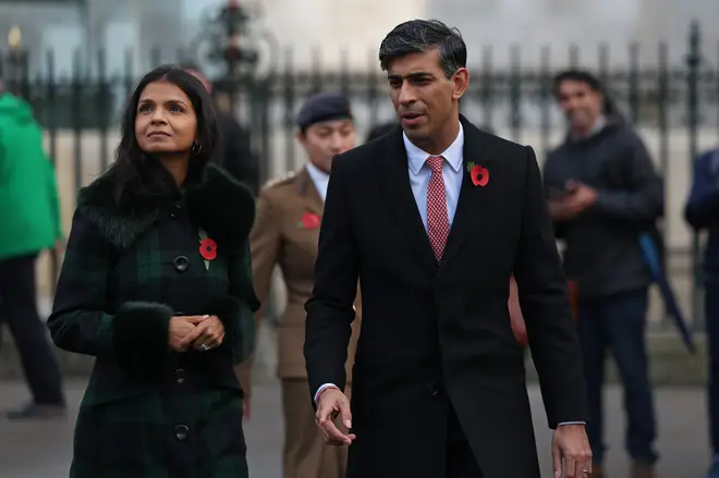 Britain's Prime Minister Rishi Sunak and wife his Akshata Murty leave having visited the Field of Remembrance at Westminster Abbey ahead of Armistice Day
