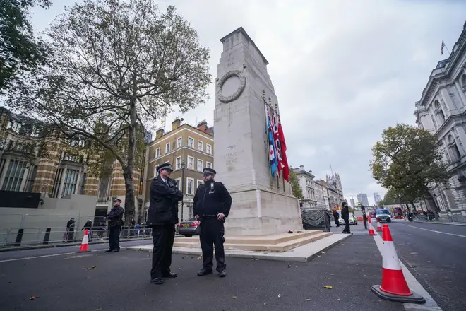 Metropolitan Police officers guarding the Cenotaph in Whitehall ahead of armistice and remembrance day commemorations this weekend