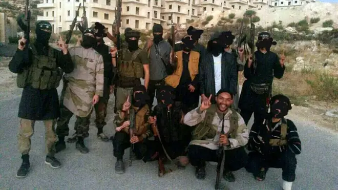 Aine Leslie Davis (bottom row, second from right) in Syria