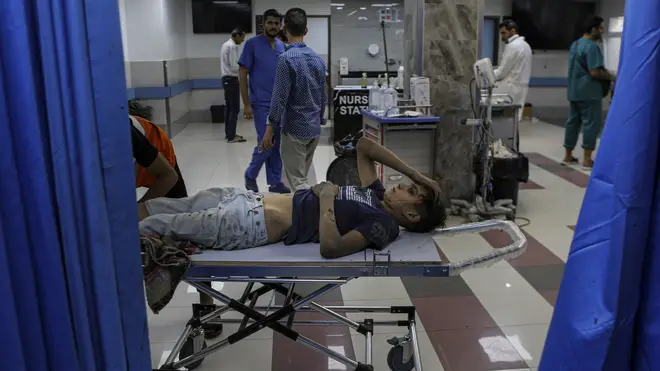 A wounded Palestinian boy in the emergency room of the Shifa Hospital