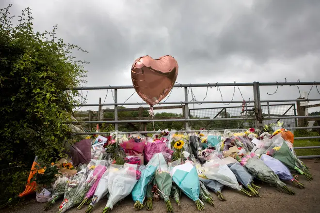 Flowers left at the scene of the murder of Gracie Spinks, near Duckmanton, Derbyshire