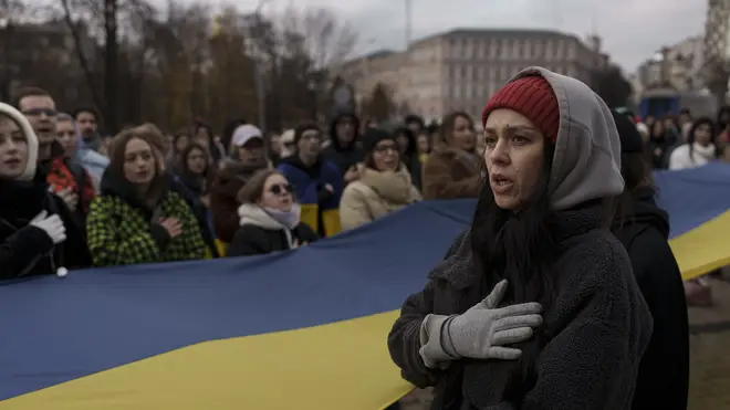Woman sings Ukrainian national anthem