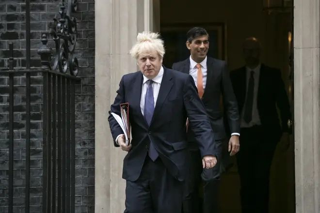 British Prime Minister Boris Johnson and Chancellor Rishi Sunak head to the weekly cabinet meeting held at the British Foreign and Commonwealth Office