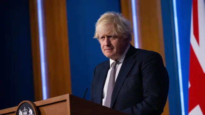 Then British Prime Minister Boris Johnson holds Covid-19 press conference alongside Chris Whitty, Chief Medical Officer, 27 November 2021