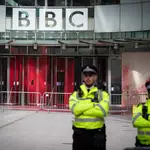 Red paint is sprayed over the BBC's headquarters ahead of a Palestine March.