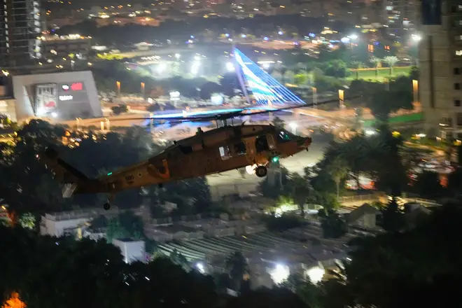 A helicopter carrying hostages released by Hamas lands at Schneider Children's Medical Center in Petah Tikva, Israel on Friday